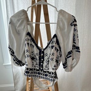 Anthropologie Cute white and blue cropped shirt.